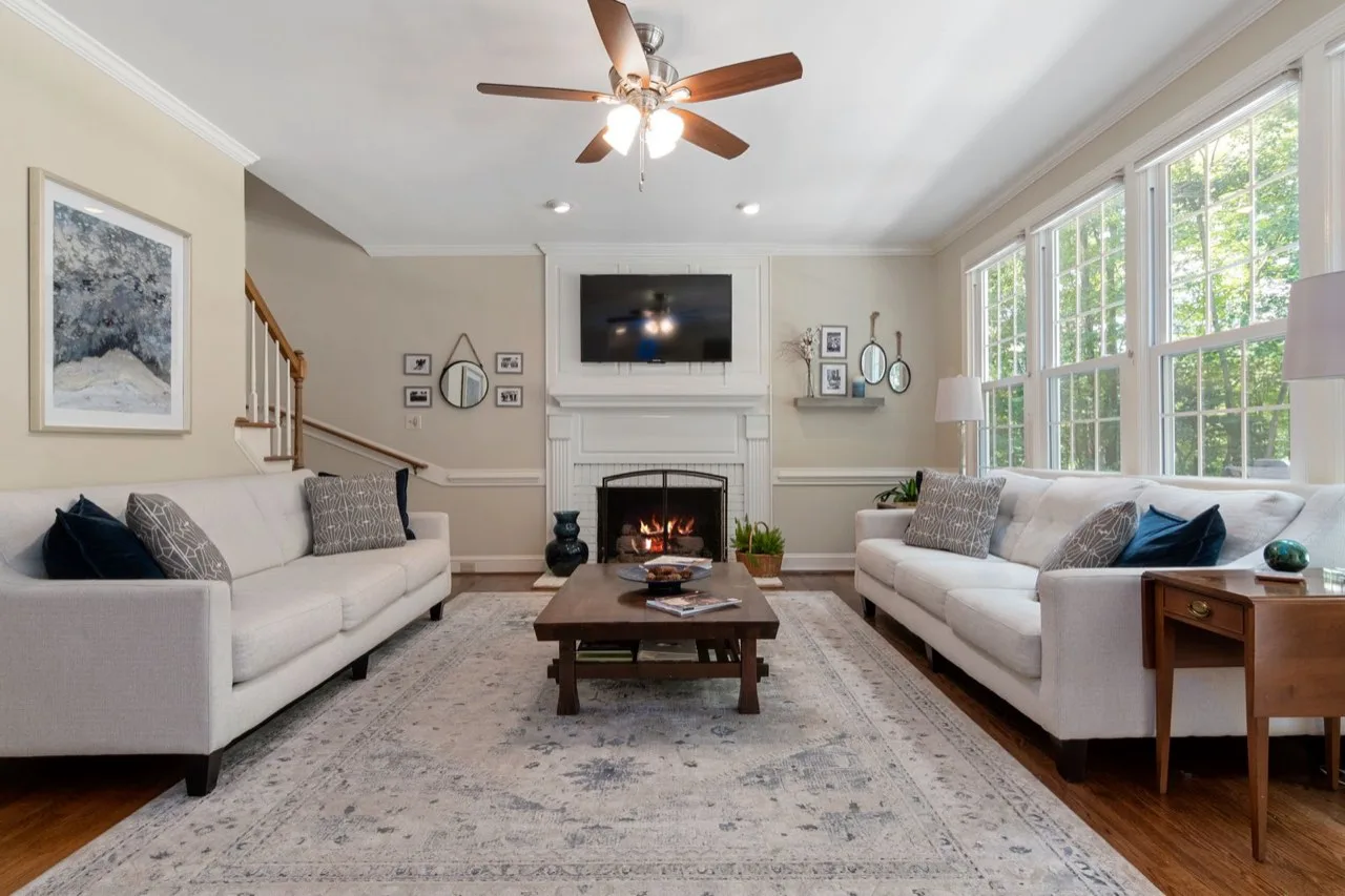Modern North American living room with a clean gas fireplace.